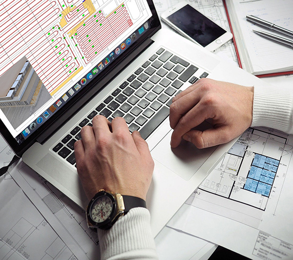 Laptop mit Planung einer PowerFloor Flächenheizung Laptop mit Planung einer PowerFloor Flächenheizung